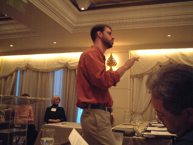 A genuine classroom shot: Eric teaches us not to put cups in the "cup holder" on the side of the laptop